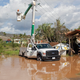 Men work to restore downed powerlines iafter damage from Hurricane Patricia October 24, 2015 in Melaque, Jalisco, Mexico.